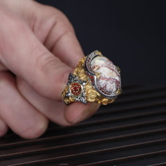 Anel Turco de prata esterlina 925 com pedra de ágata rendada e banhado a ródio. 